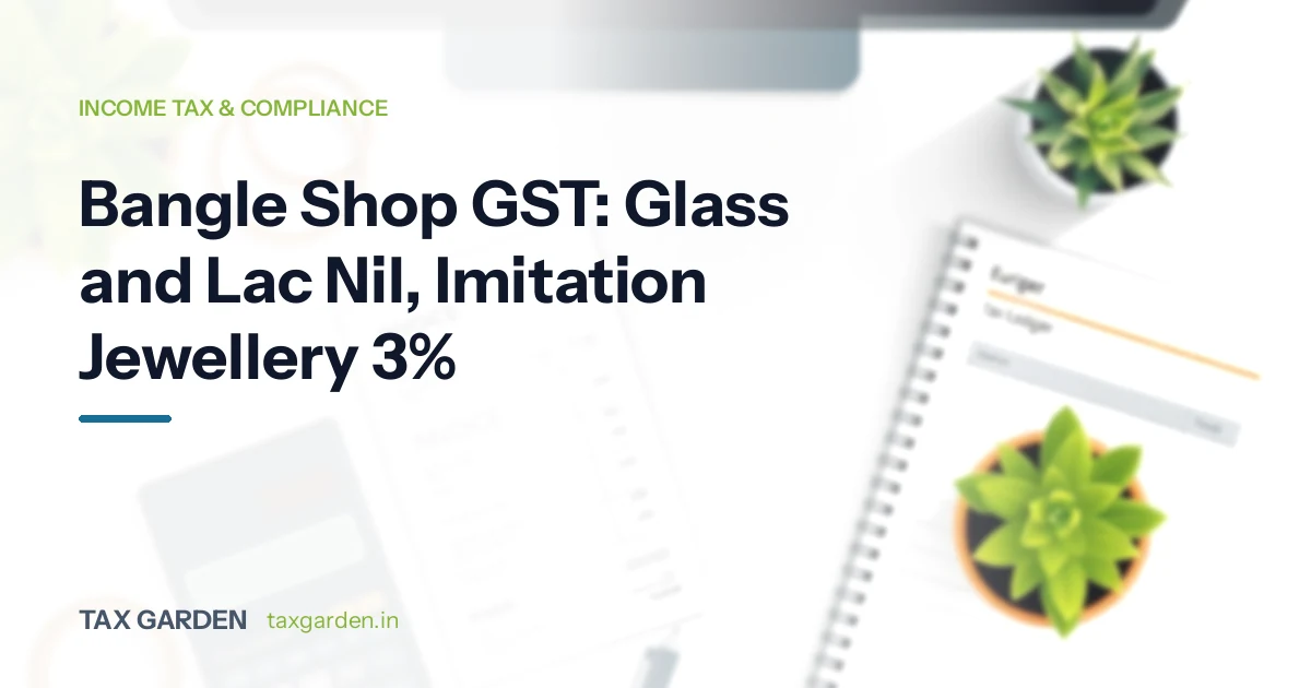 A desk with a tax ledger notebook, a phone and potted succulents, for a GST and income tax guide for bangle shops