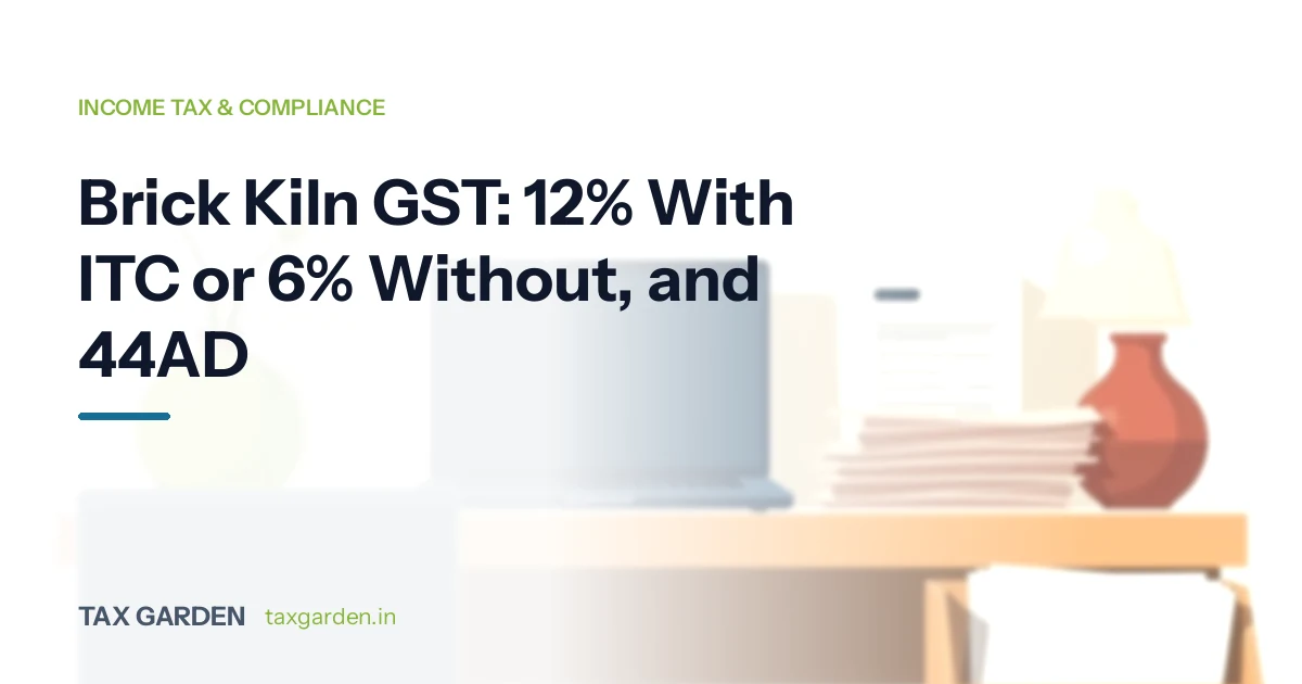 Desk with a laptop, stacked tax papers and a terracotta vase for a guide to 12% or 6% GST and income tax for brick kilns