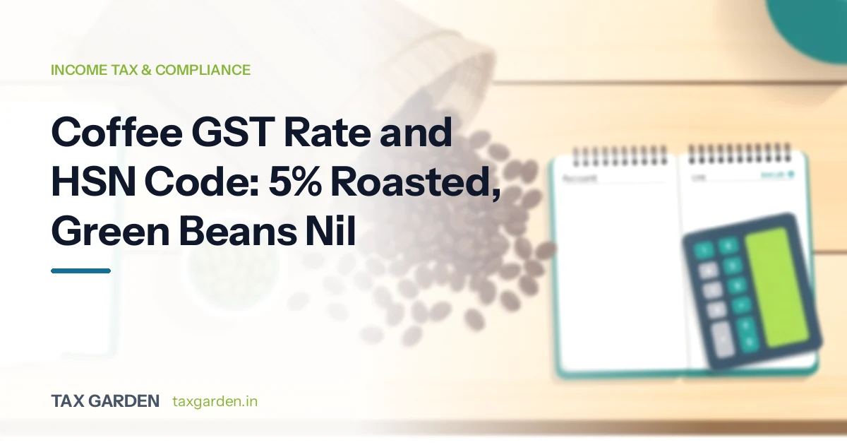 Headline on coffee GST rate and HSN code at 5 percent beside roasted coffee beans, a ledger and a calculator on a desk