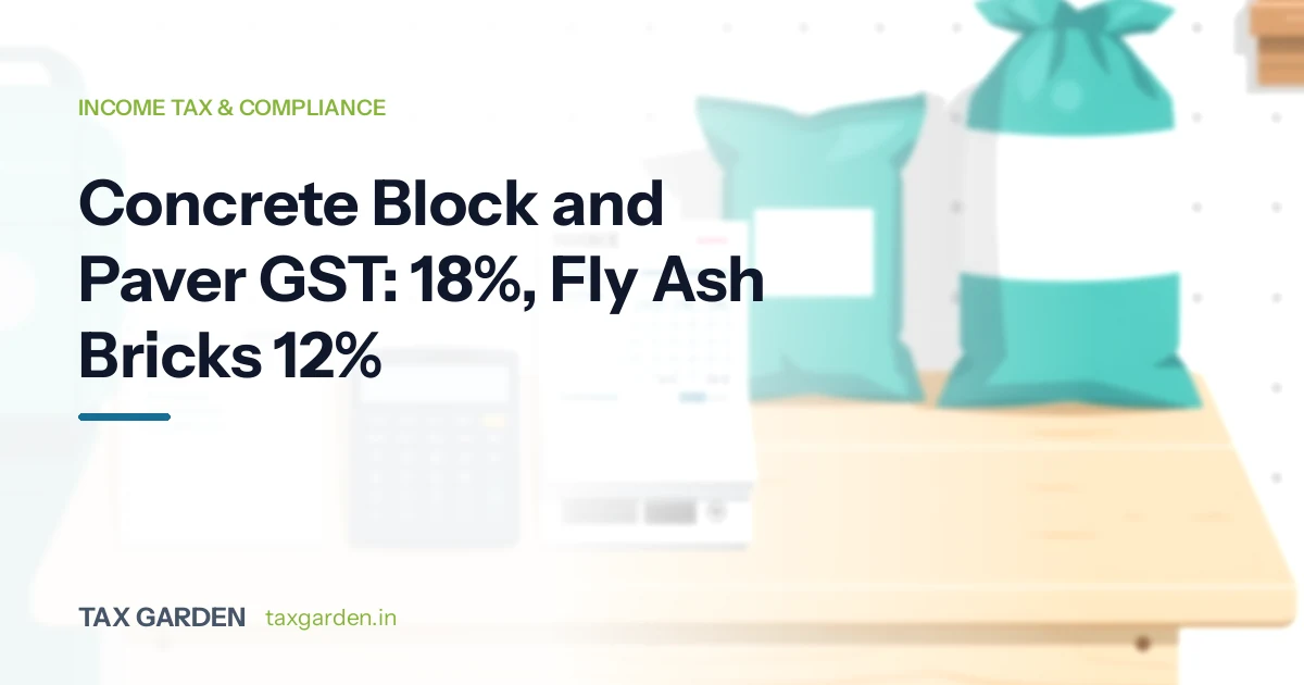 Headline on concrete block, paver and fly ash brick GST rates beside a calculator, invoice and material sacks