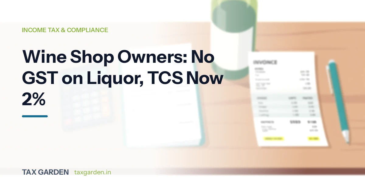 Wooden desk with a calculator, notebook, printed invoice, pen and a green bottle for a guide to GST, TCS and income tax for wine shop owners
