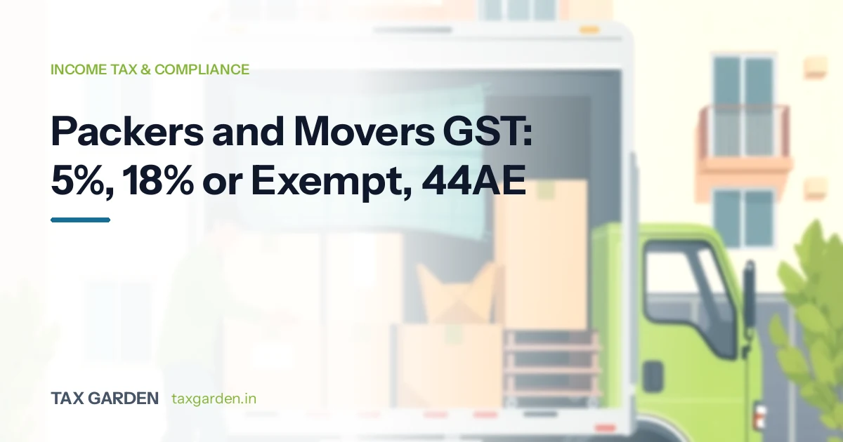 Goods truck loaded with cardboard cartons outside an apartment block, for a GST and income tax guide for packers and movers